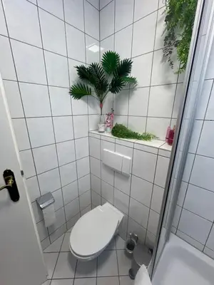 Ein Badezimmer in der Unterkunft Stübchen am Theaterplatz
