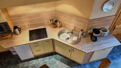 Küche/Küchenzeile in der Unterkunft Hotel Olbernhau mit Sauna - Kleines Landhotel zur Ofenschenke
