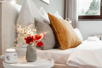 Ein Bett oder Betten in einem Zimmer der Unterkunft Ferienhaus Tannenblick Rochlitz