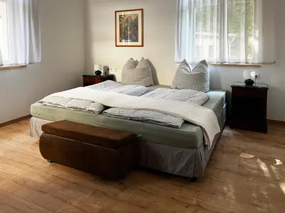 Ein Bett oder Betten in einem Zimmer der Unterkunft Wauermühle