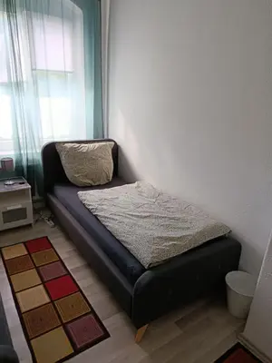Ein Bett oder Betten in einem Zimmer der Unterkunft Ferienwohnung - Monteur Sleep 1 - max 6 Personen
