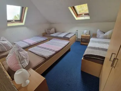 Ein Bett oder Betten in einem Zimmer der Unterkunft Pension Wansner