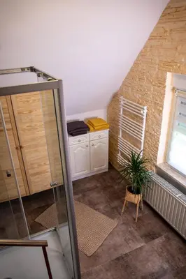 Ein Bett oder Betten in einem Zimmer der Unterkunft Pension & Ferienwohnung Zum Waldblick