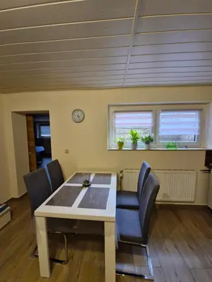 Ein Sitzbereich in der Unterkunft Ferienwohnung Weigl