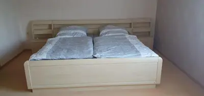 Ein Bett oder Betten in einem Zimmer der Unterkunft Ferienwohnung Bienchen