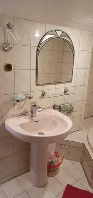 Ein Badezimmer in der Unterkunft Ferienwohnung Bienchen