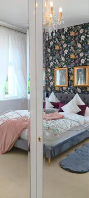 Ein Bett oder Betten in einem Zimmer der Unterkunft VILLA FREIA Dresden - Exklusive Ferienwohnung zum Erholen & Entspannen