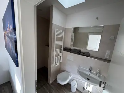 Ein Badezimmer in der Unterkunft Pension Hertel
