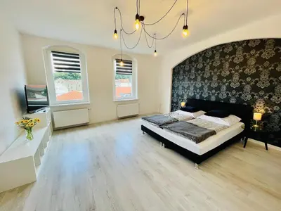 Ein Bett oder Betten in einem Zimmer der Unterkunft Mitten in Meißen moderne Ferienwohnung No 5