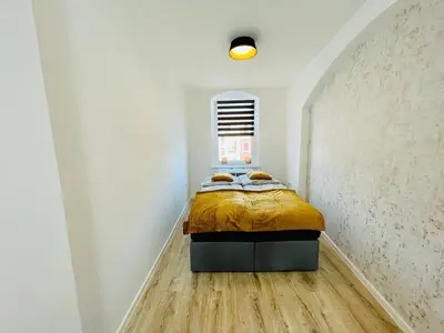 Ein Bett oder Betten in einem Zimmer der Unterkunft Wunderschönes Meissen - Apartment in der Innenstadt No6