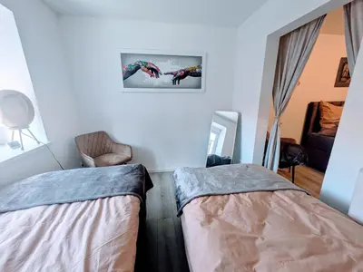 Ein Bett oder Betten in einem Zimmer der Unterkunft Urlaubsresidenz Schlossblick