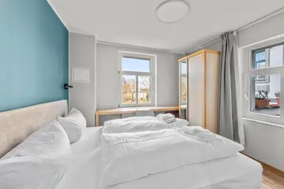 Ein Bett oder Betten in einem Zimmer der Unterkunft Hotel Friedrichstadt