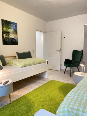 Ein Bett oder Betten in einem Zimmer der Unterkunft Terassenblick am See
