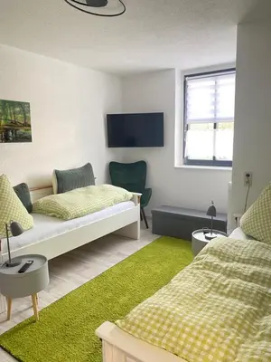 Ein Bett oder Betten in einem Zimmer der Unterkunft Terassenblick am See