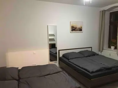 Ein Bett oder Betten in einem Zimmer der Unterkunft Modern apartment, Randneustadt with great connections