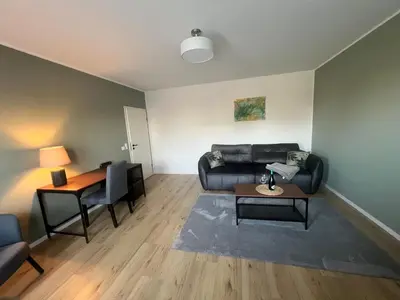 Ein Sitzbereich in der Unterkunft Exklusive und moderne Ferienwohnung