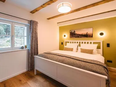 Ein Bett oder Betten in einem Zimmer der Unterkunft Look into the country Comfortable holiday residence