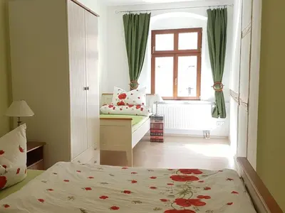 Ein Bett oder Betten in einem Zimmer der Unterkunft above painters studio