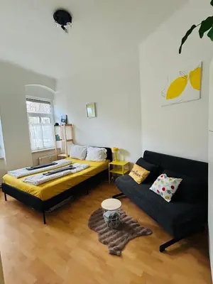 Ein Sitzbereich in der Unterkunft hello&welcome Dresden City-Apartment