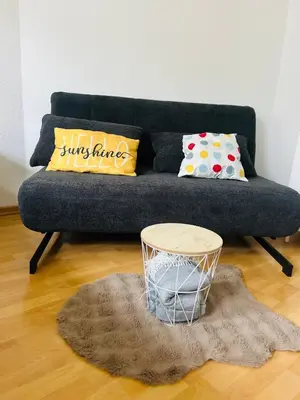 Ein Sitzbereich in der Unterkunft hello&welcome Dresden City-Apartment