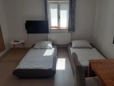 Ein Bett oder Betten in einem Zimmer der Unterkunft Fewo Gartenblick