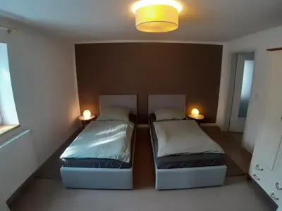 Ein Bett oder Betten in einem Zimmer der Unterkunft Fewo Gartenblick