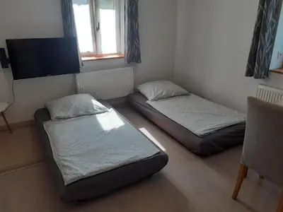Ein Bett oder Betten in einem Zimmer der Unterkunft Fewo Gartenblick