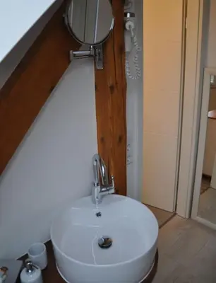 Ein Badezimmer in der Unterkunft Pension AM REICHEN BERG
