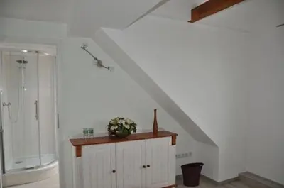 Ein Badezimmer in der Unterkunft Pension AM REICHEN BERG