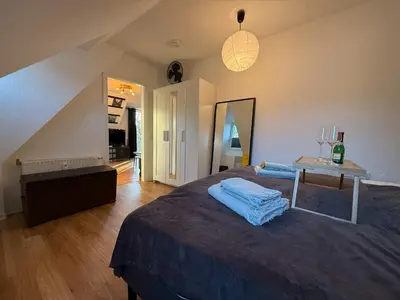 Ein Bett oder Betten in einem Zimmer der Unterkunft Wohnperle Käthe85 Elbschlösser
