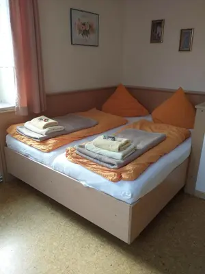 Ein Bett oder Betten in einem Zimmer der Unterkunft Haus Waldesheim
