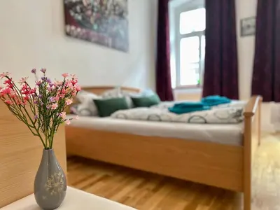 Ein Bett oder Betten in einem Zimmer der Unterkunft Altstadt Suite 120qm WLAN Balkon 2 Bäder