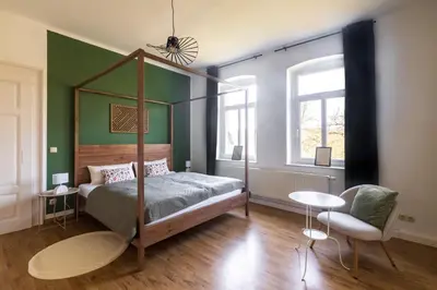 Ein Bett oder Betten in einem Zimmer der Unterkunft HohnsteinOase-Fasssauna und Kühlbecken-3 SZ-Parkplatz - Waschmaschine
