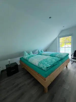 Ein Bett oder Betten in einem Zimmer der Unterkunft Ferienwohnung Matka