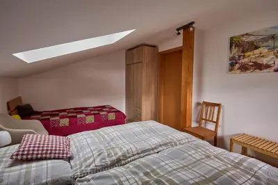 Ein Bett oder Betten in einem Zimmer der Unterkunft Suite der Villa Elsa