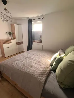 Ein Bett oder Betten in einem Zimmer der Unterkunft Hinterhaus am Stadtrand Chemnitz