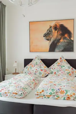 Ein Bett oder Betten in einem Zimmer der Unterkunft Zentrum, 2R, eigene Terrasse, WiFi, 4P, modern, ruhig