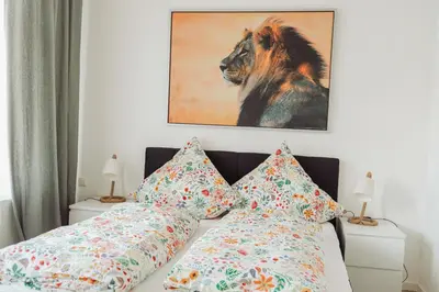 Ein Bett oder Betten in einem Zimmer der Unterkunft Zentrum, 2R, eigene Terrasse, WiFi, 4P, modern, ruhig