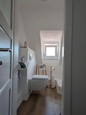 Ein Bett oder Betten in einem Zimmer der Unterkunft Ferienwohnung Alte Bäckerei