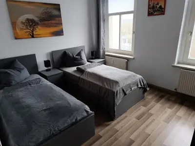 Ein Bett oder Betten in einem Zimmer der Unterkunft Zentral gelegen und voll ausgestattet
