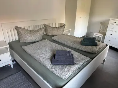 Ein Bett oder Betten in einem Zimmer der Unterkunft Dein Hideaway - Grimma entdecken und genießen