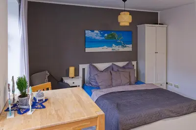 Ein Bett oder Betten in einem Zimmer der Unterkunft Gemütliches Apartment in Chemnitz Rabenstein
