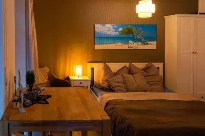 Ein Bett oder Betten in einem Zimmer der Unterkunft Gemütliches Apartment in Chemnitz Rabenstein