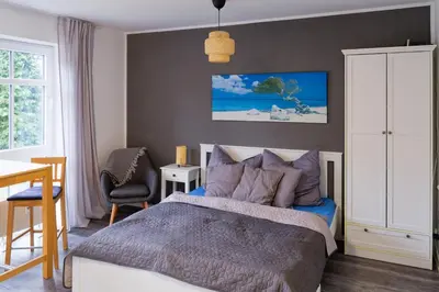 Ein Bett oder Betten in einem Zimmer der Unterkunft Gemütliches Apartment in Chemnitz Rabenstein