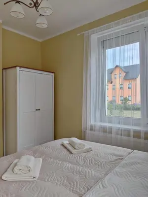 Ein Bett oder Betten in einem Zimmer der Unterkunft Eine gemütliche Ferienwohnung