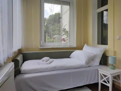 Ein Bett oder Betten in einem Zimmer der Unterkunft Eine gemütliche Ferienwohnung