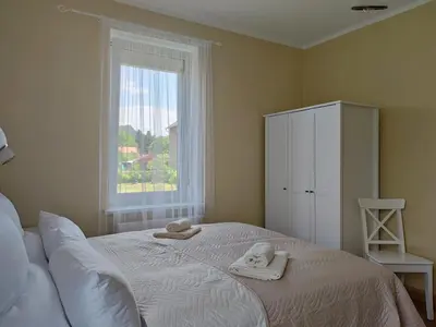 Ein Bett oder Betten in einem Zimmer der Unterkunft Eine gemütliche Ferienwohnung
