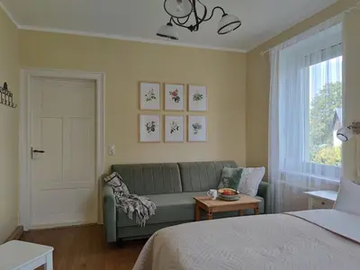 Ein Bett oder Betten in einem Zimmer der Unterkunft Eine gemütliche Ferienwohnung