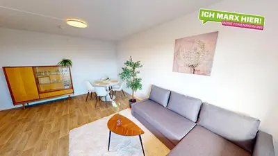 Ein Sitzbereich in der Unterkunft Apartment mit bodengleicher Dusche, 170m bis zur Haltestelle Linie 5, WLAN