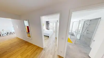 Ein Badezimmer in der Unterkunft Apartment mit bodengleicher Dusche, 170m bis zur Haltestelle Linie 5, WLAN